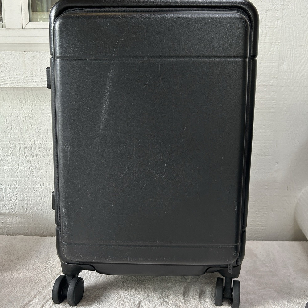 CALPAK Black Hard Shell Rolling Spinner 22" Suitcase Luggage Carry-On Style Bag